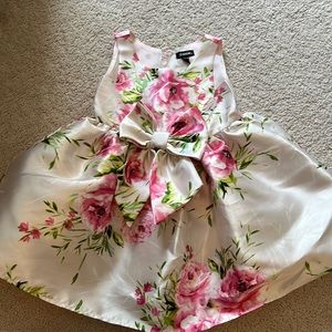 Adorable tea length dress with bow